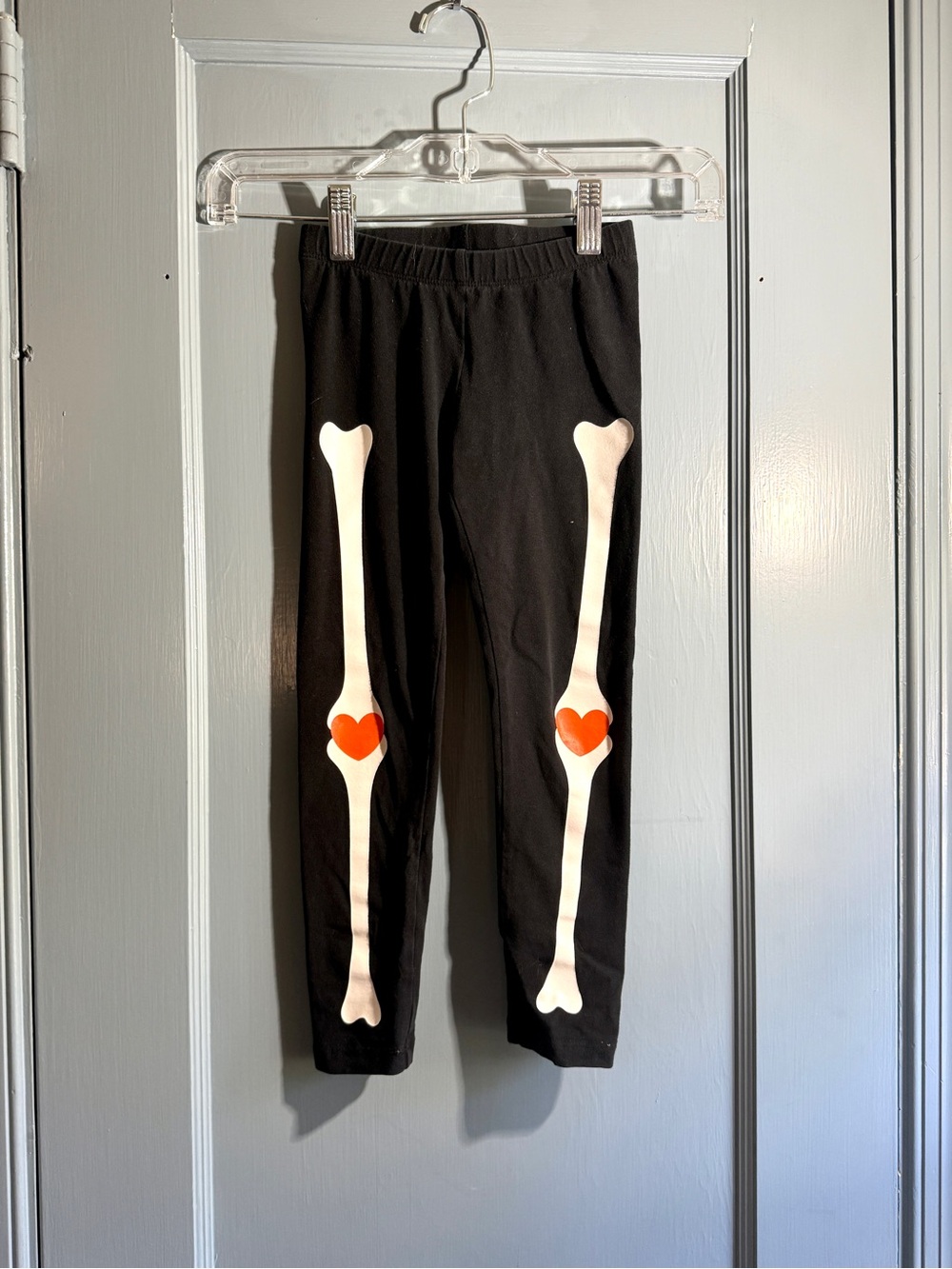 Cat & Jack Black Leggings with White Bone and Orange-Red Heart